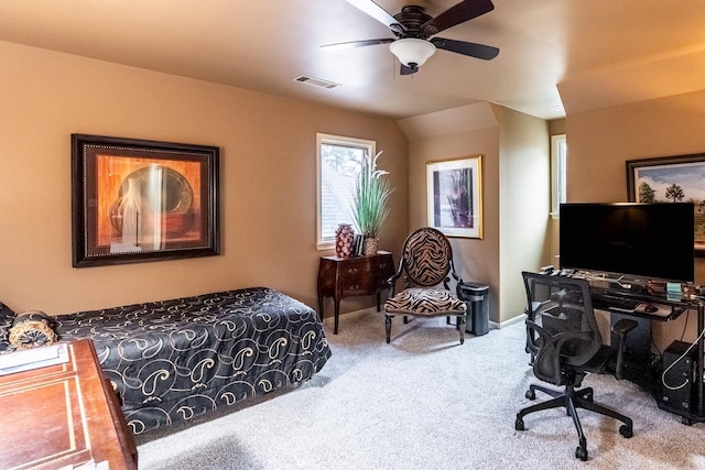 bedroom with ceiling fan and carpet flooring