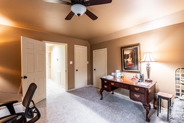 carpeted home office with ceiling fan