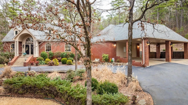 view of front of property with a carport