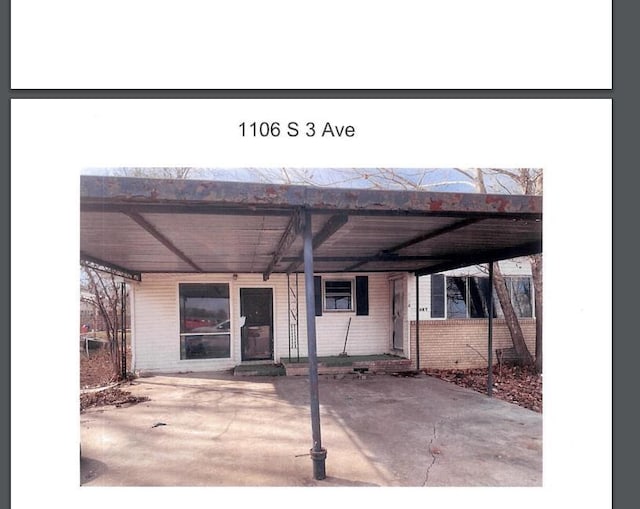 view of patio with a carport