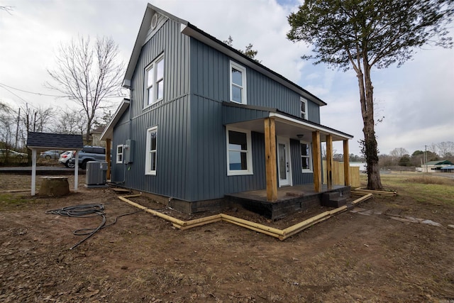 exterior space featuring a porch and central AC unit