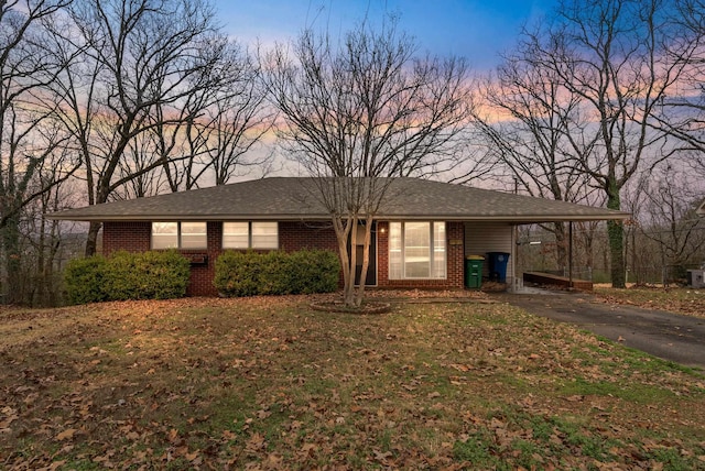 view of front of home featuring a carport