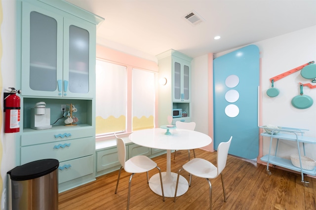 dining room featuring wood-type flooring