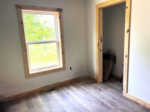 605 Frances Cv, Mountain View, AR 72560 - unfurnished room featuring wood finished floors and baseboards