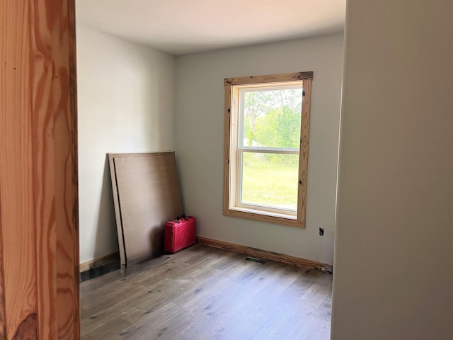 605 Frances Cv, Mountain View, AR 72560 - empty room featuring wood finished floors and baseboards