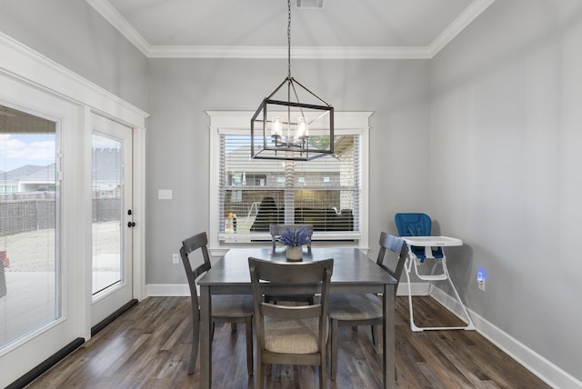 dining room featuring ornamental molding and a healthy amount of sunlight