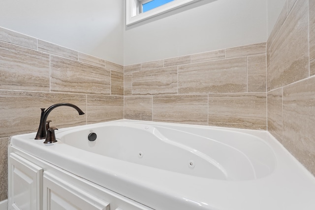 bathroom with a washtub