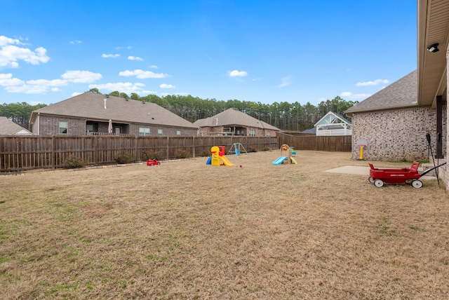 view of yard featuring a playground