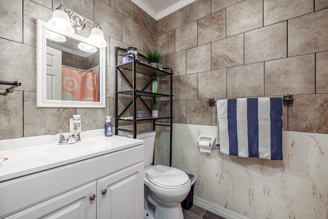 bathroom featuring vanity, a shower with curtain, and toilet