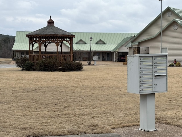 view of home's community featuring a gazebo and a mail area