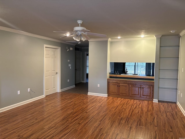 unfurnished living room featuring ornamental molding, dark hardwood / wood-style floors, and ceiling fan