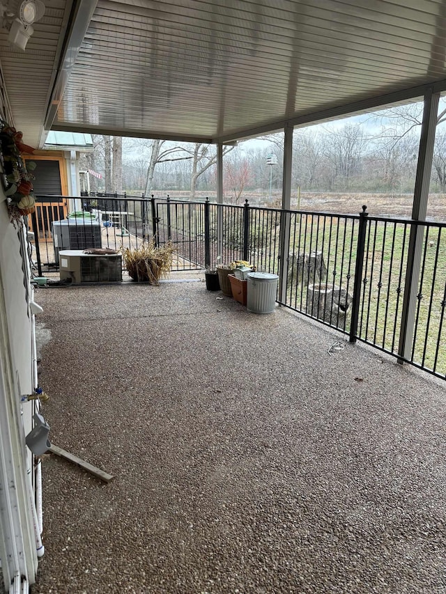 exterior space featuring a jacuzzi