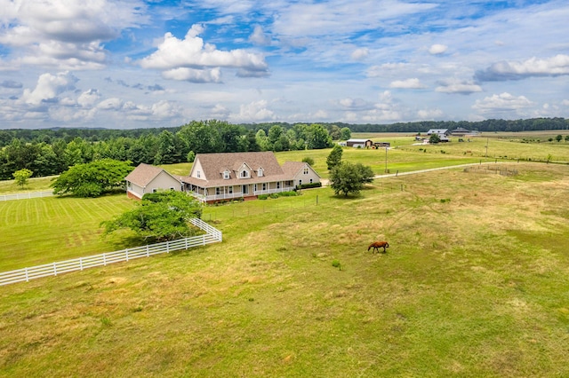 birds eye view of property featuring a rural view