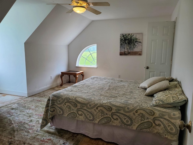 bedroom with ceiling fan and vaulted ceiling