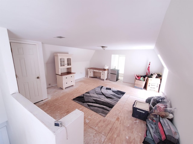 bonus room featuring light wood-type flooring