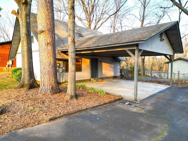 view of front of property with a carport