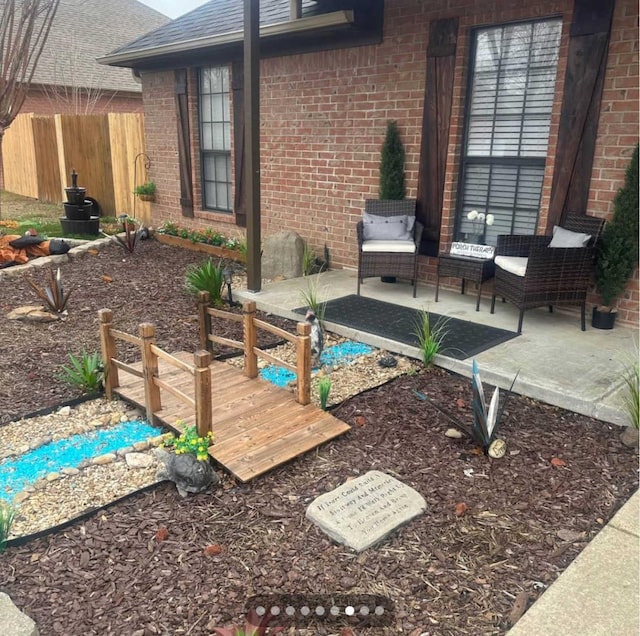 view of patio featuring an outdoor living space and a deck