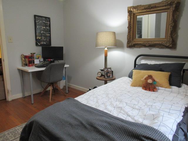 bedroom featuring hardwood / wood-style flooring