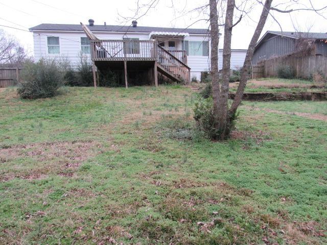 view of yard with a deck