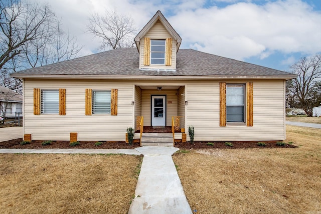 view of front of home with a front yard