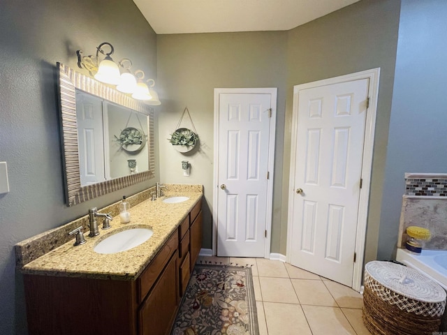 bathroom with tile patterned flooring and vanity