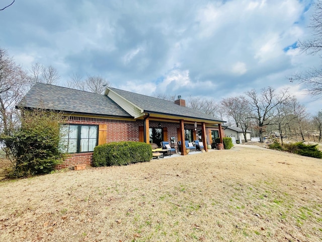 exterior space with a yard