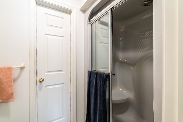 bathroom featuring an enclosed shower