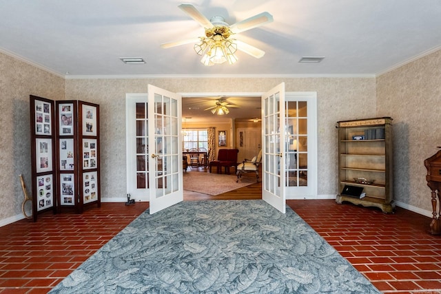 interior space with french doors, ceiling fan, and ornamental molding