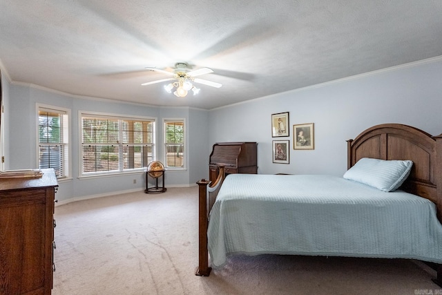 bedroom with crown molding, ceiling fan, and light carpet