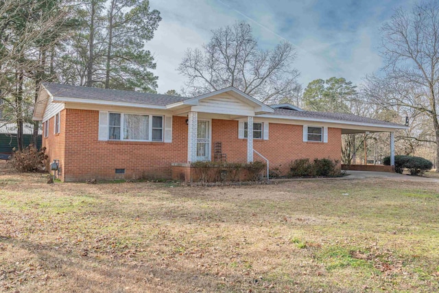 single story home featuring a front yard and a carport