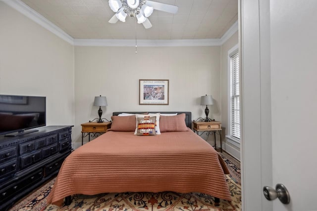 bedroom featuring ornamental molding and ceiling fan