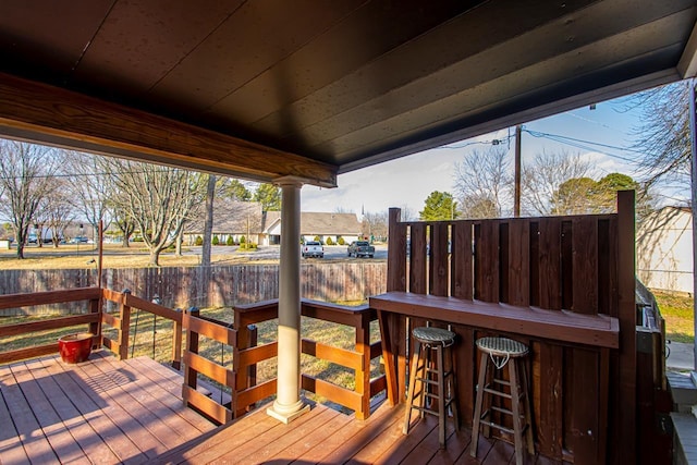 wooden terrace featuring an outdoor bar