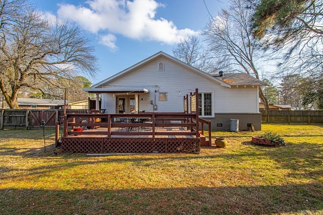 rear view of house with central AC, a yard, and a deck