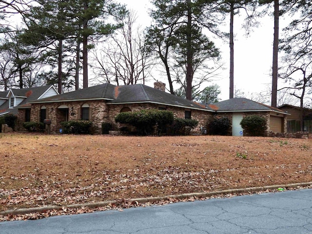 view of side of property with a garage