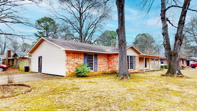 view of property exterior featuring a lawn