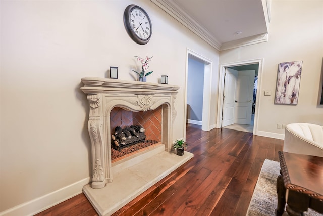 corridor with crown molding and dark hardwood / wood-style flooring