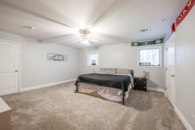 bedroom featuring ceiling fan and carpet flooring