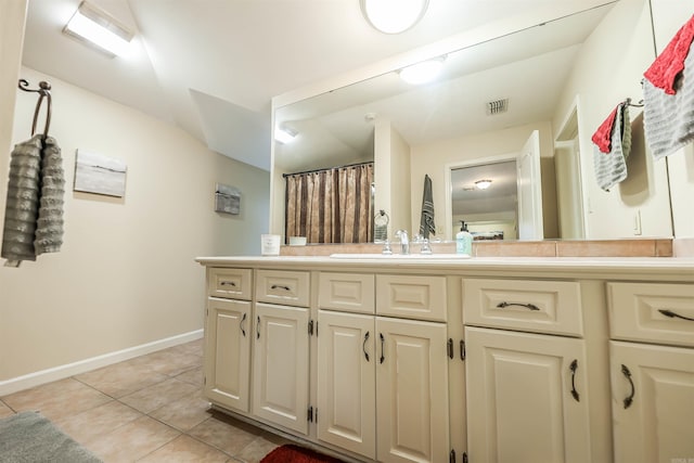 bathroom featuring vanity and tile patterned floors