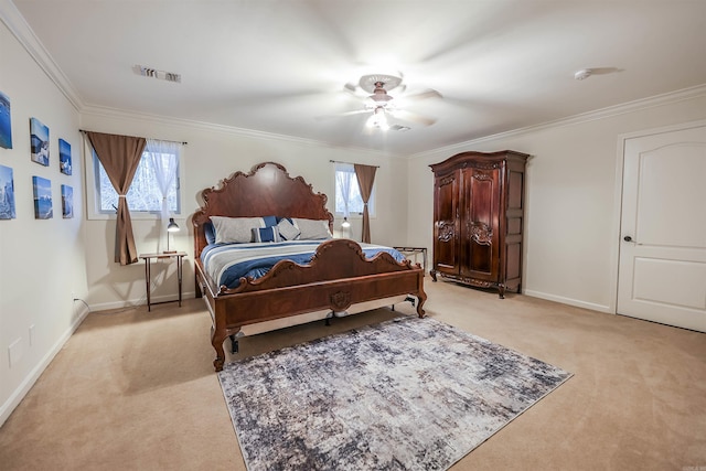 bedroom with multiple windows, crown molding, light colored carpet, and ceiling fan