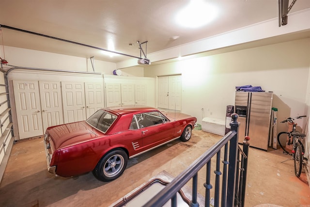 garage featuring a garage door opener