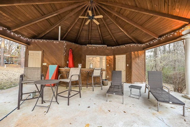 view of patio / terrace featuring a gazebo and ceiling fan