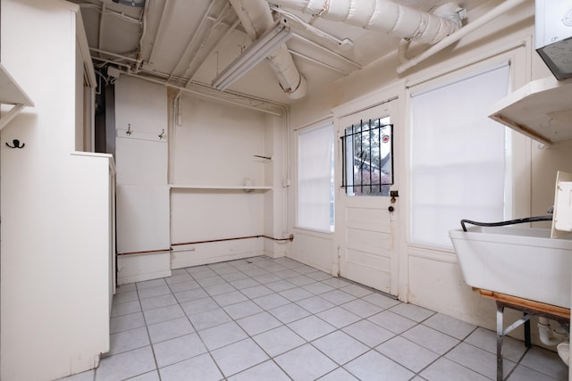 interior space featuring light tile patterned floors