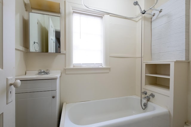 bathroom featuring vanity and tub / shower combination