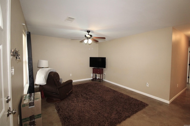 living room with ceiling fan