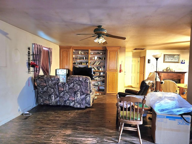 bedroom featuring ceiling fan and dark hardwood / wood-style flooring