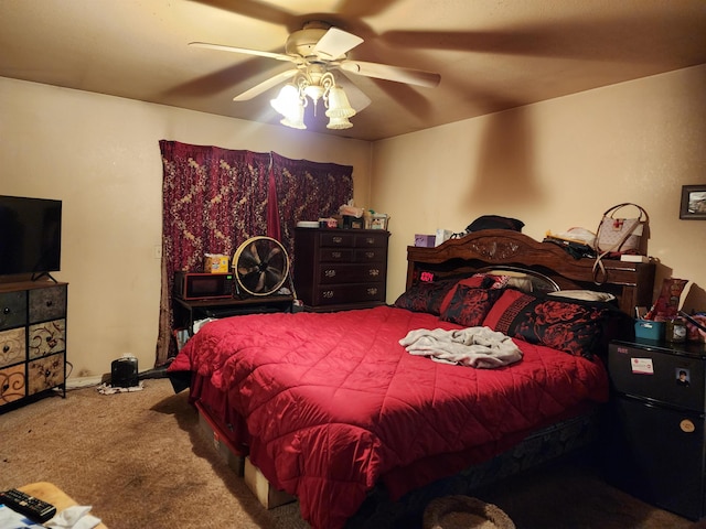 bedroom with ceiling fan and carpet