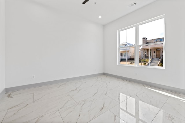 empty room featuring ceiling fan