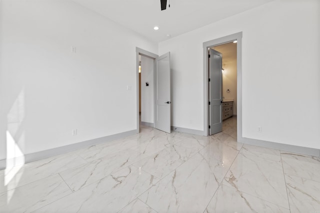 interior space with ceiling fan