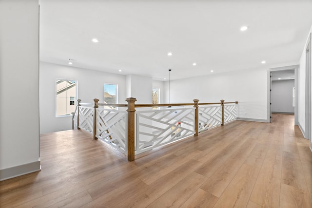 corridor featuring light hardwood / wood-style floors