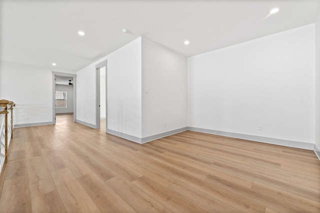 empty room with light hardwood / wood-style floors